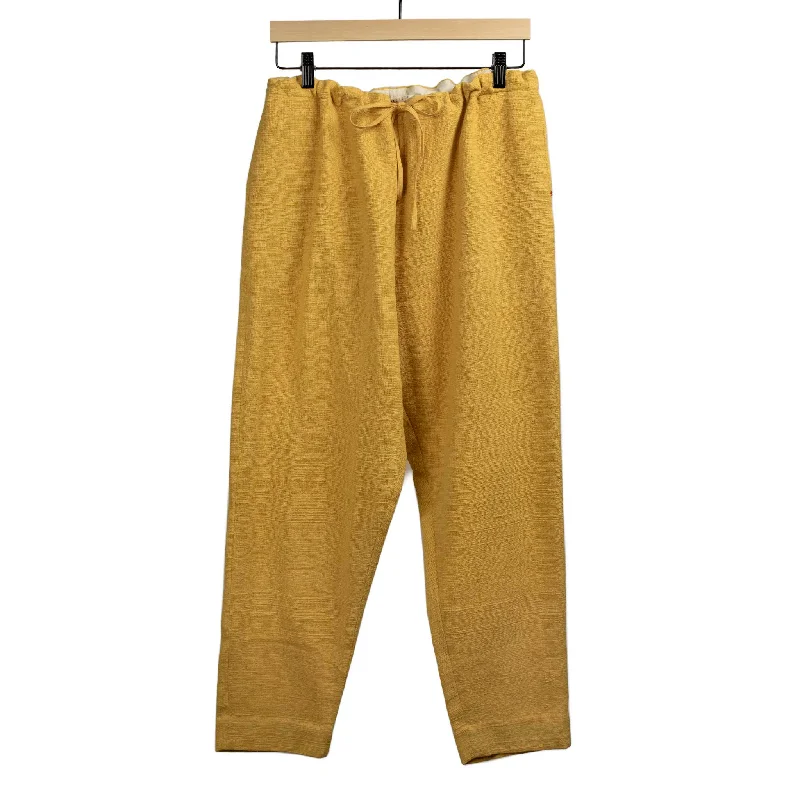 Casual Travel Pants-Drawstring tapered trousers in mango yellow cotton basketweave